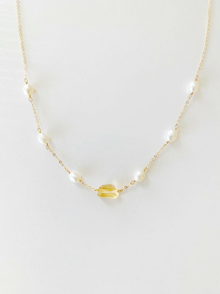 sun and snow necklace view 1