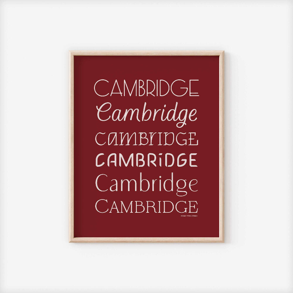 A framed picture of the word "Cambridge" drawn in various lettering styles. Artwork has a red and white color scheme