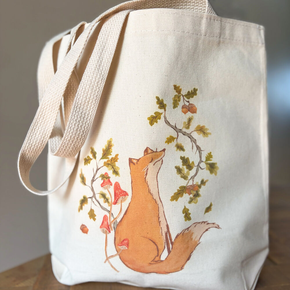 Artist illustration of fox sitting among autumn leaves, branches and acorns
