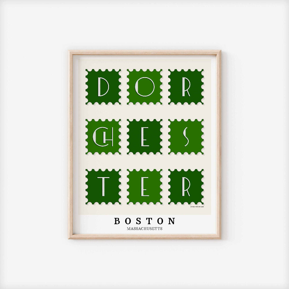 A framed picture of postage stamps featuring the Dorchester neighborhood in Boston, Massachusetts drawn in a unique lettering style. Artwork has a green and white color scheme