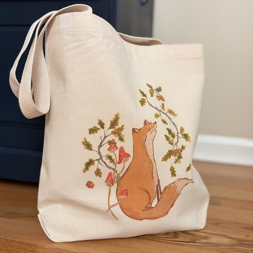 Artist illustration of fox sitting among autumn leaves, branches and acorns